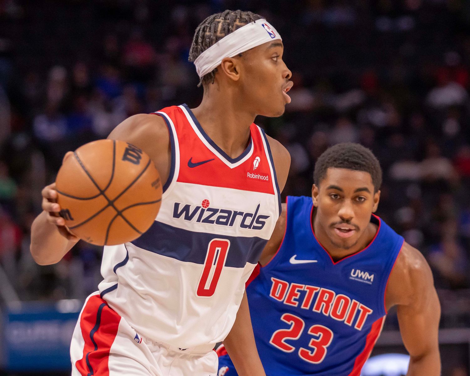 Washington Wizards guard Bilal Coulibaly (0) controls the ball in front of Detroit Pistons guard Jaden Ivey (23) during the second half at Little Caesars Arena.